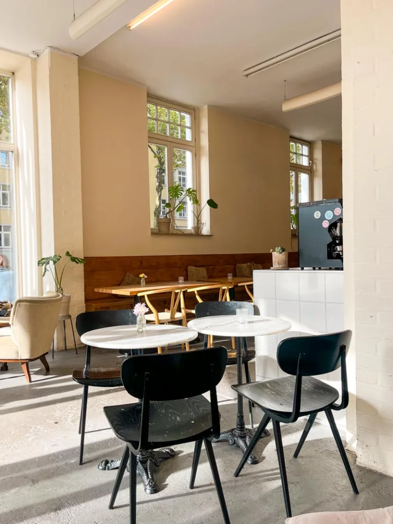 Minimalist, airy interior of Cafe 19sieben in Münster, Germany