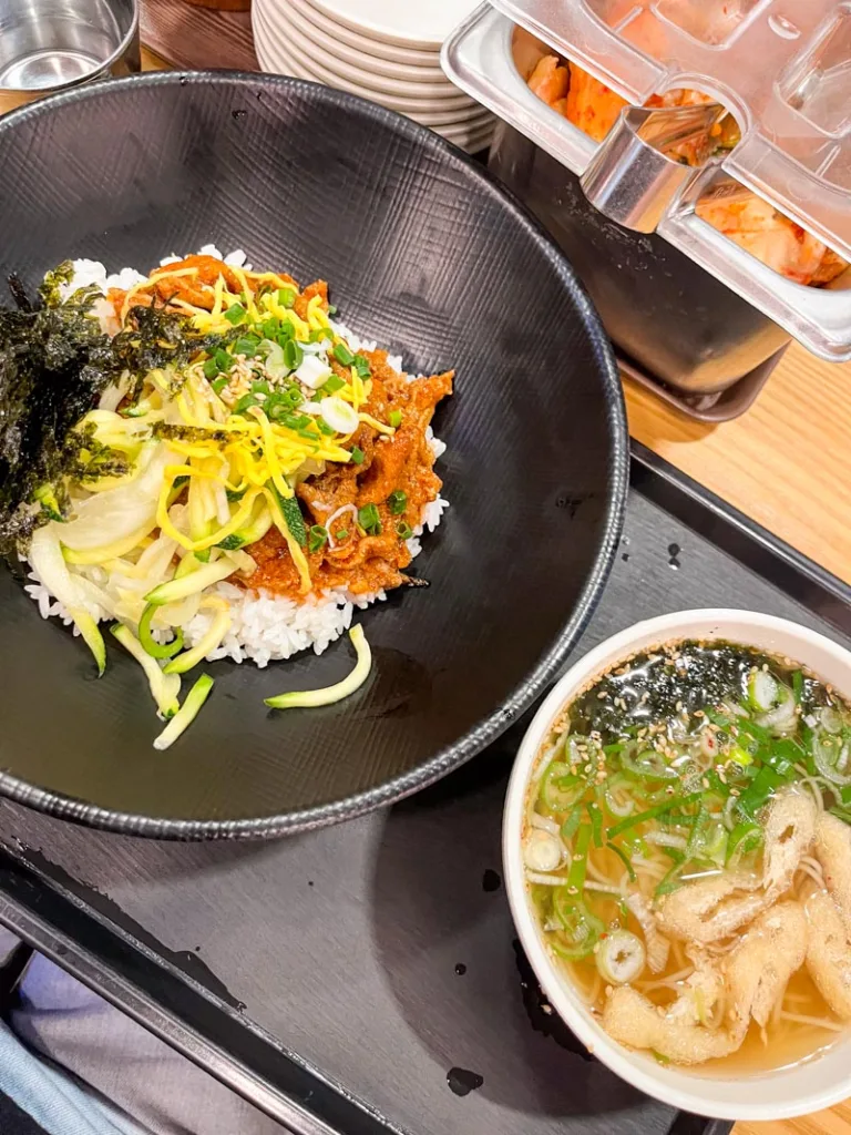 a spicy pork rice bowl at a restaurant in the bukchon hanok village in seoul