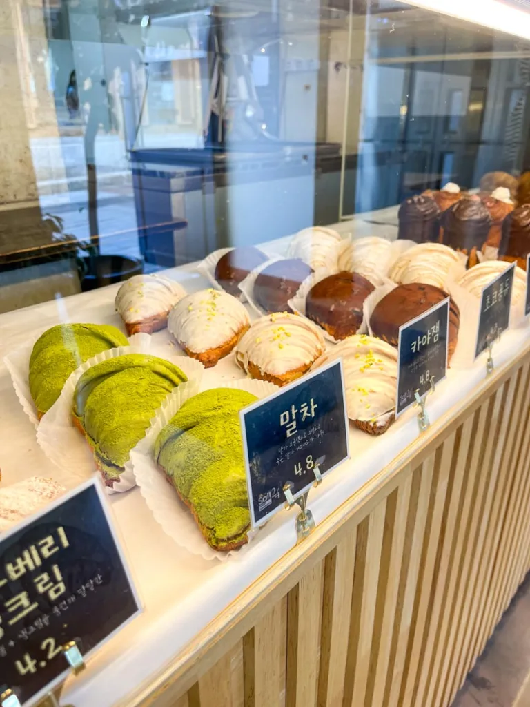 display of different flavored croissants at salt 24 in the bukchon hanok village in seoul