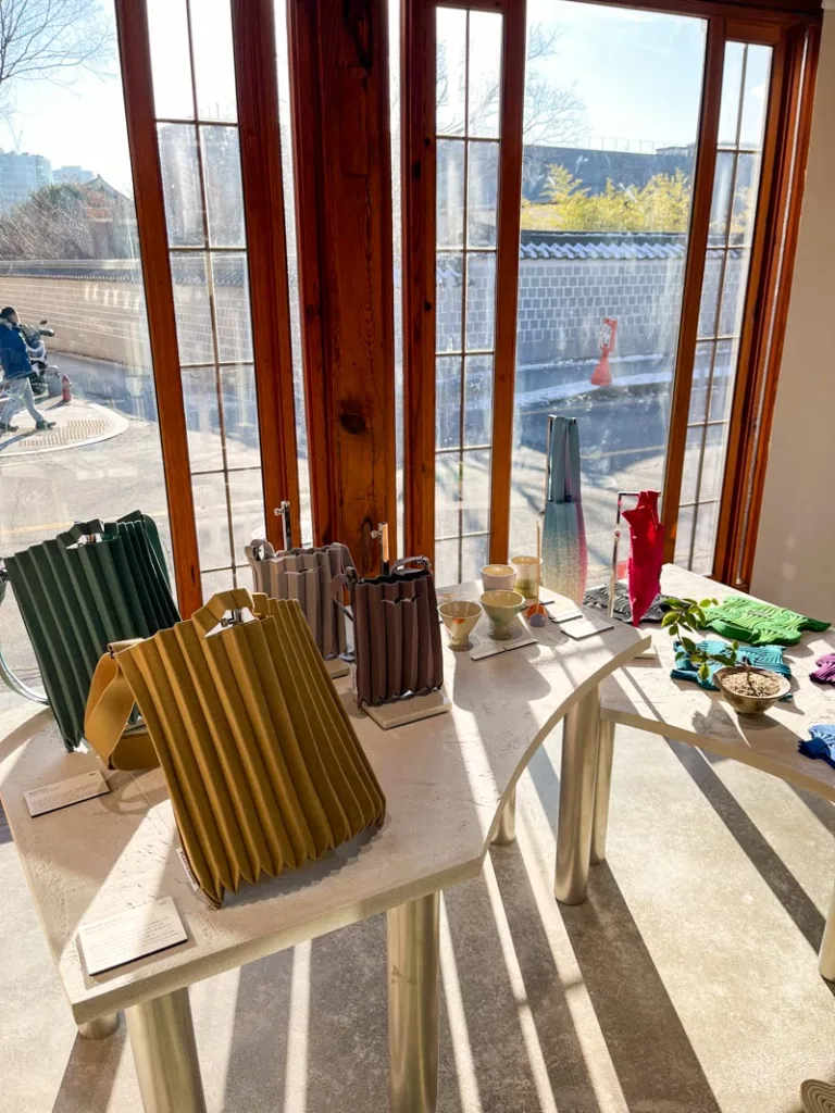 display of bags at pleats mama shop in the bukchon hanok village in seoul