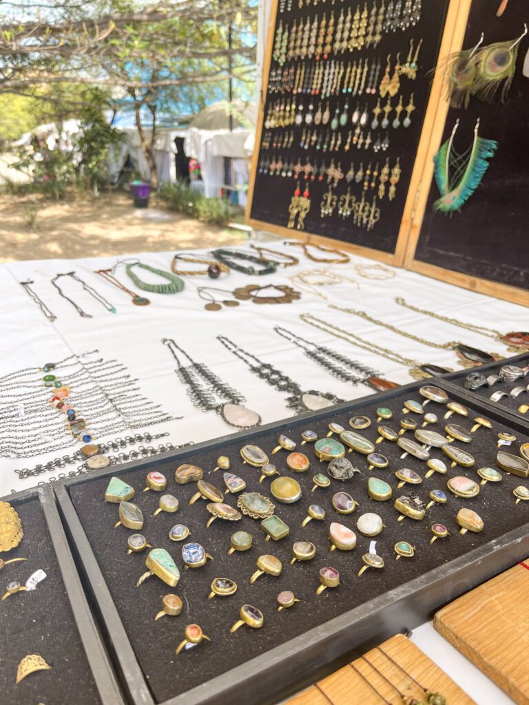 Handmade jewelry stand at a street market in Oaxaca City