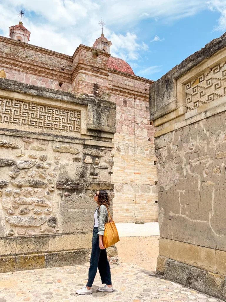 Woman exploring Mitla Archeological site in Oaxaca, Mexico