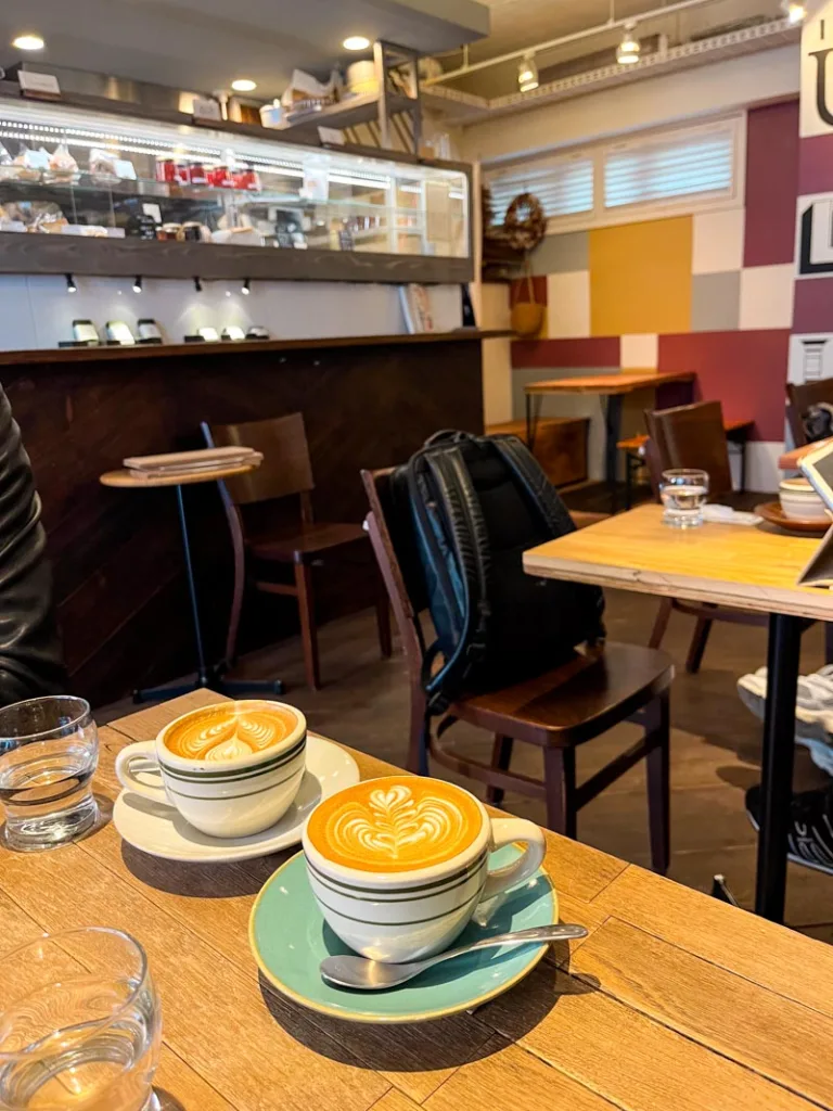 two lattes on a table at the usual coffee shop in tokyo