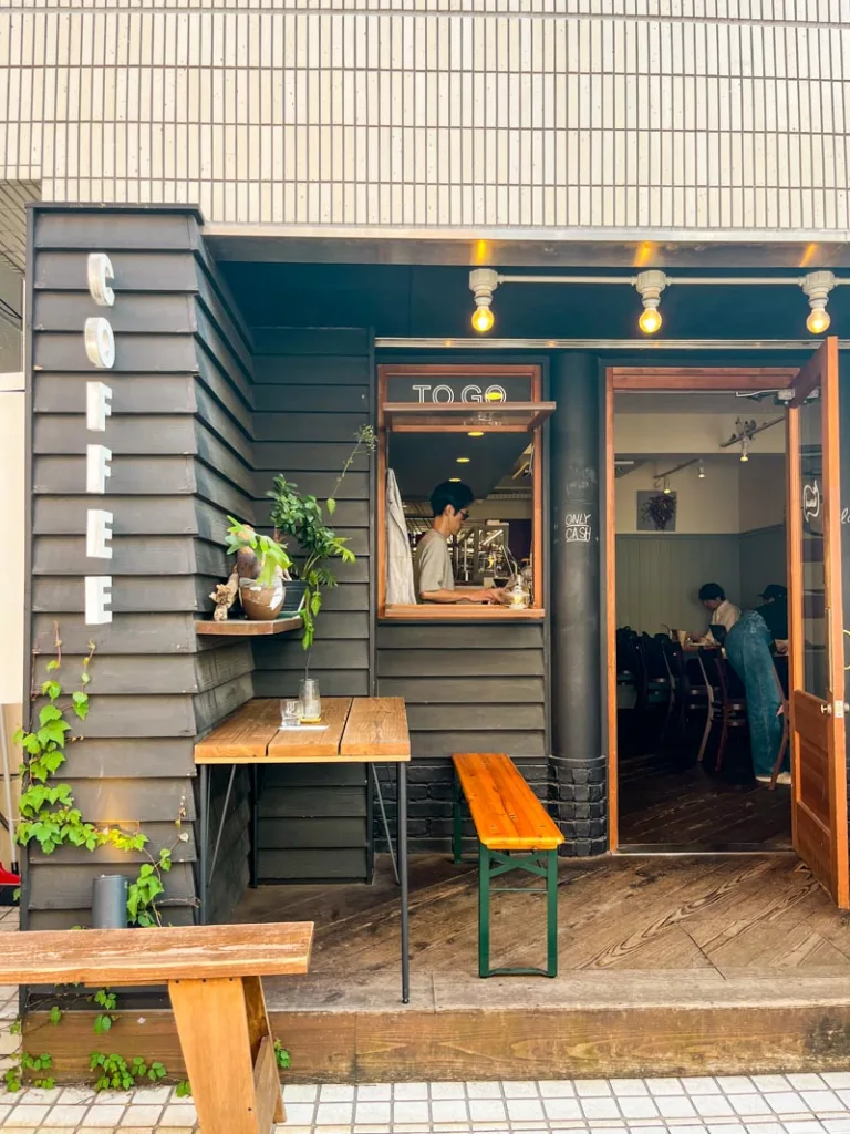 dark wood facade of the usual coffee shop in tokyo