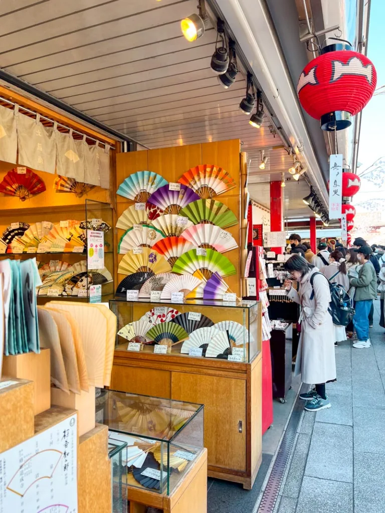 fans on display at a stand in asakusa shopping street in tokyo
