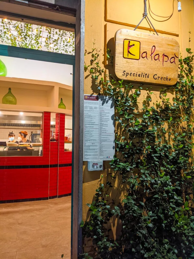 facade of kalapa greek food restaurant in pigneto, rome