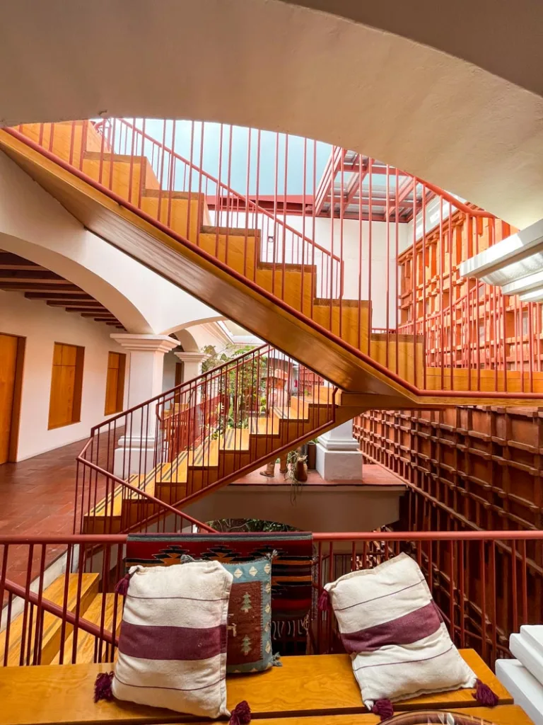 copper color staircase at ayook hotel in oaxaca city