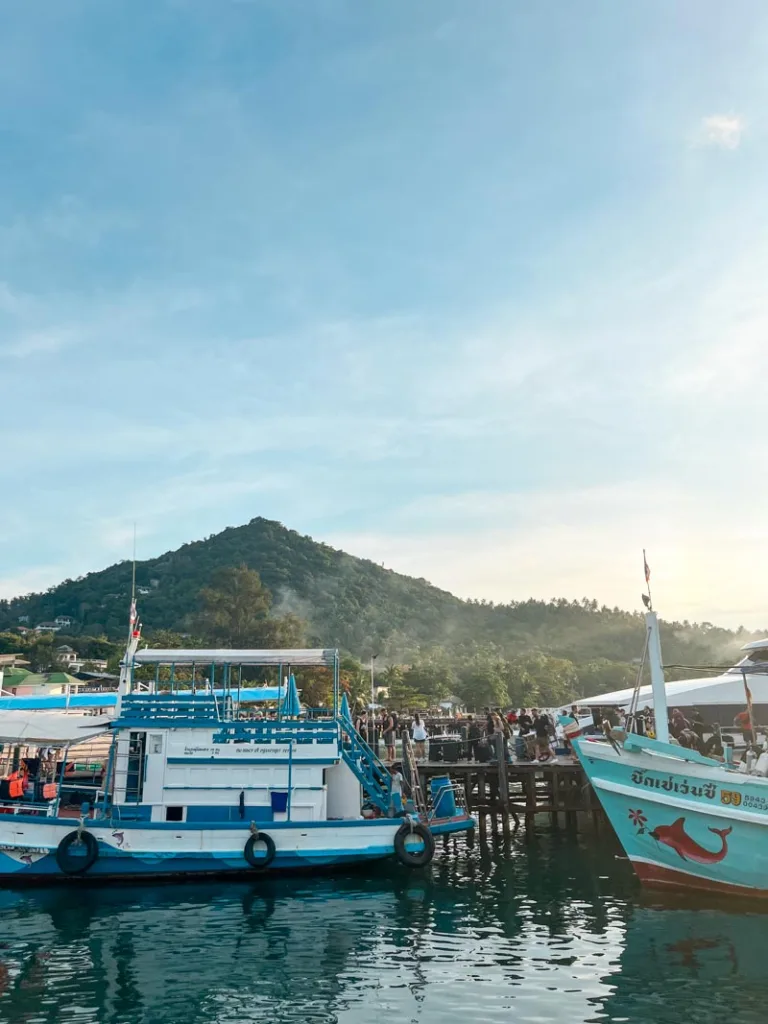 boats at mae haad pier in koh tao, thailand