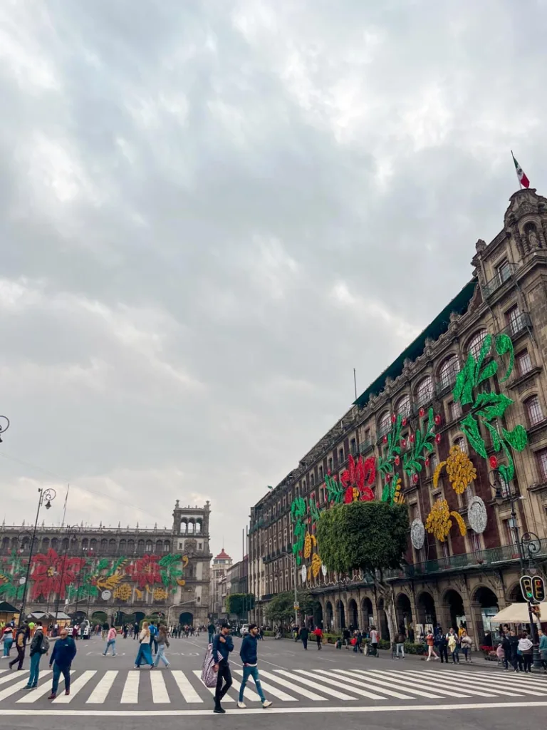people crossing the streets close to el zocalo in mexico city