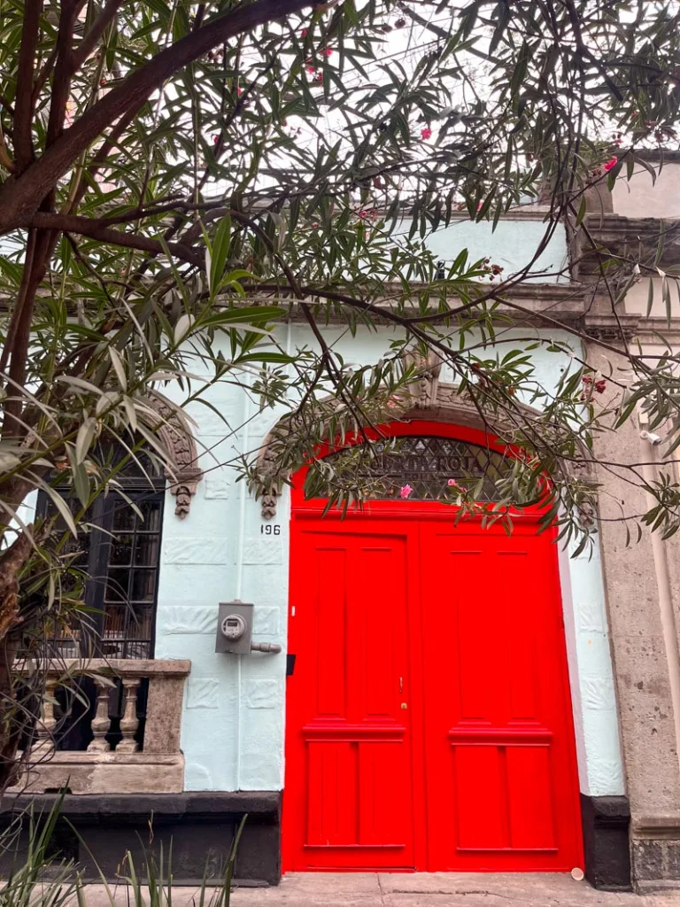 bright red door in roma norte in mexico city