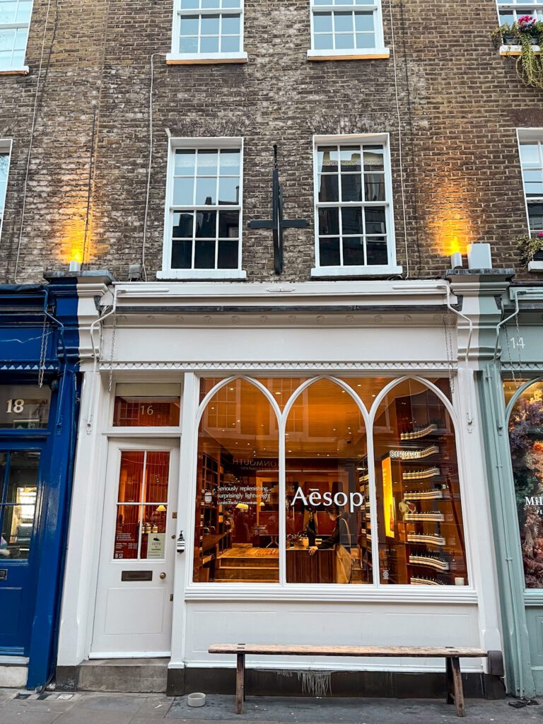 white facade of aesop shop in covent garden, london