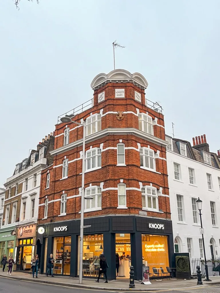 black facade of a knoops chocolate shop in london