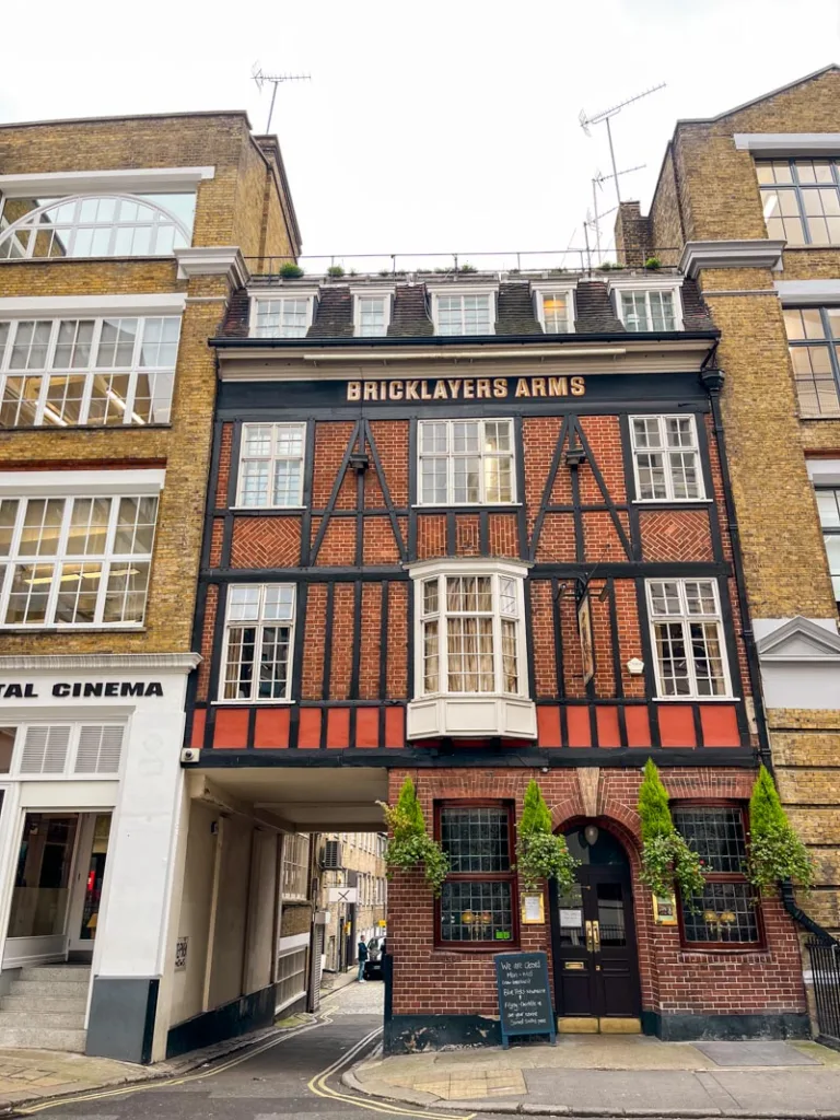 facade of a london pub housed in half-timbered buildling
