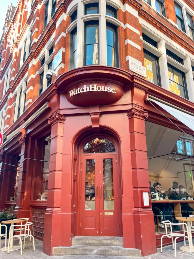 burnt red facade of watch house coffee shop in covent garden, london