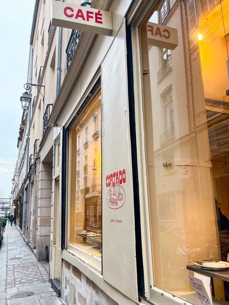 cafe sign outside cortado coffee shop in paris