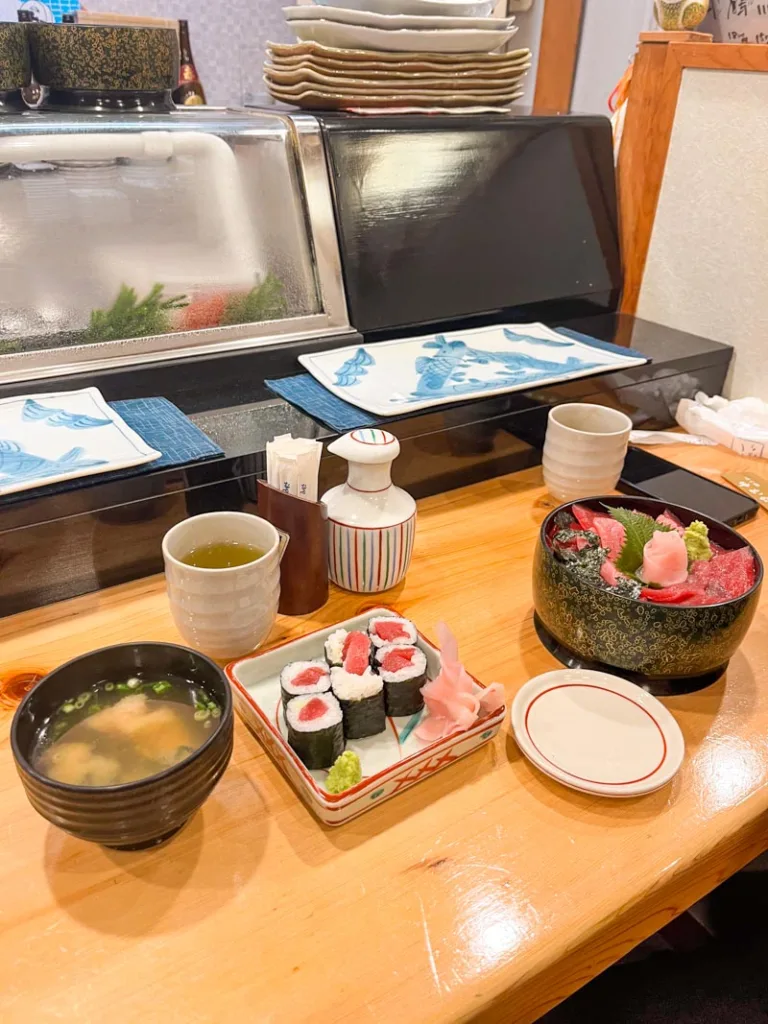 tuna maki, miso soup, two cups of green tea, and a tuna bowl at nakamuraya sushi in hakone
