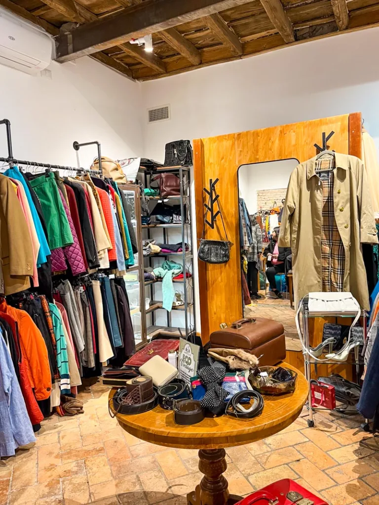 Racks of clothes at a thrift store in Trastevere