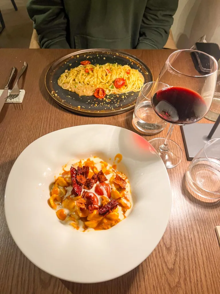 Pasta dishes and a glass of red wine at Keiv Ristorante, the best place to finisgh a day in Matera, Italy