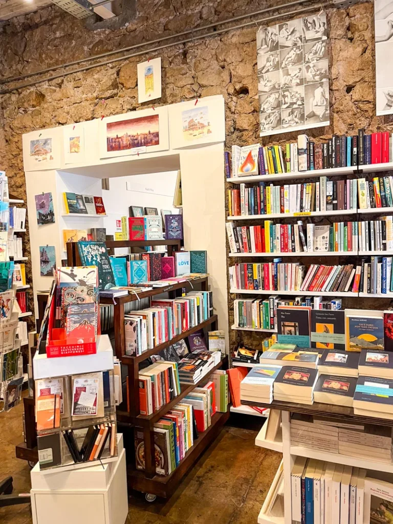 Shelves filled with books at Panisperna Libreria in Monti, Rome