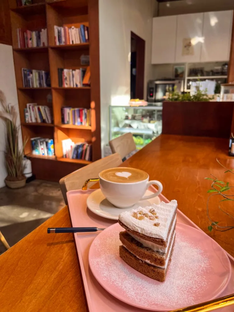 a latte and a slice of cake at cafe soodal in seoul