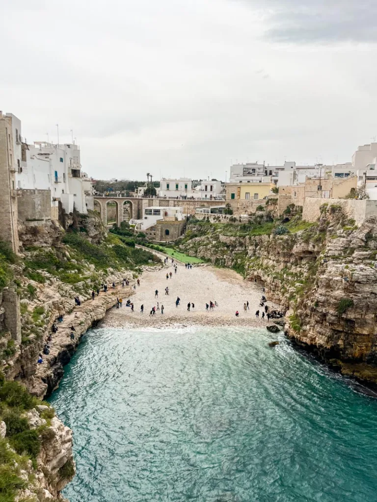 birds eye view of the iconic lama monachile in polignano a mare