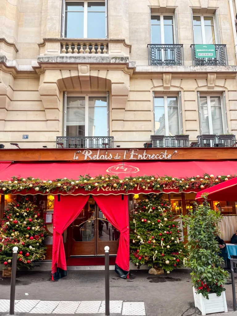 red facade of le relais de l'entrecote restaurant in saint-germain-de-pres in paris