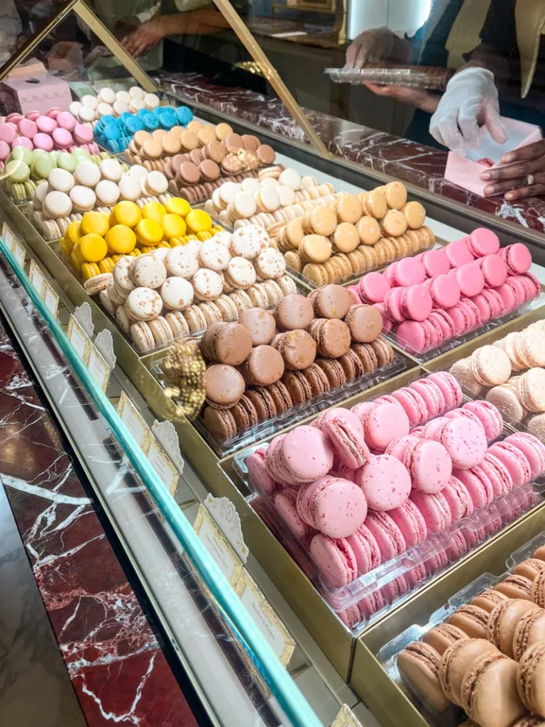 colorful display of many macarons flavors at laduree shop in paris