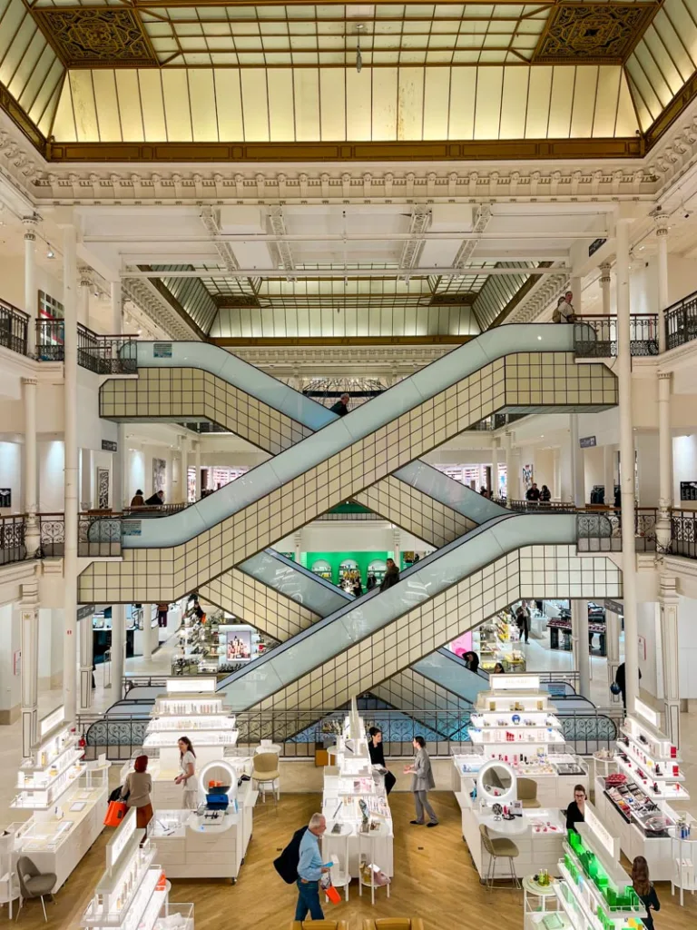 the iconic tile staircase at le bon marche in paris