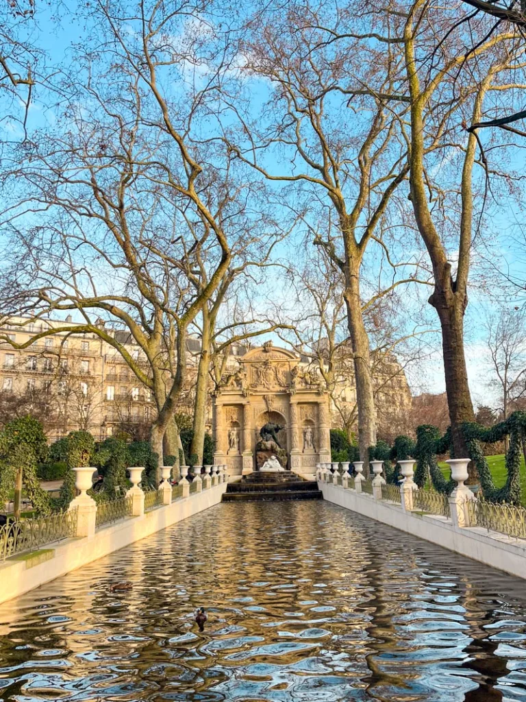 view of the picturesque marie de medicis fountain in paris