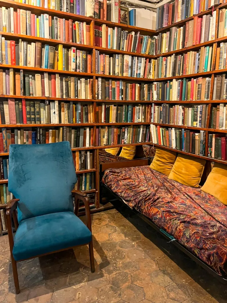 reading nook inside shakespeare and co english bookshop in paris