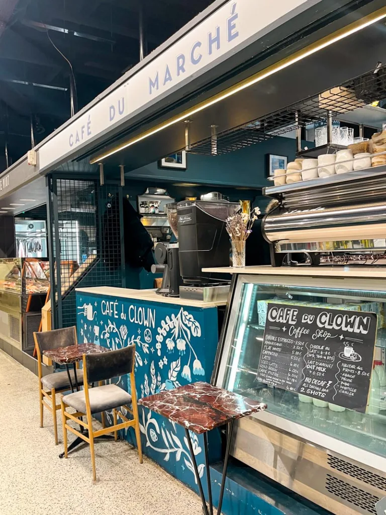 cafe du clown stand inside the marche alimentaire st germain in paris