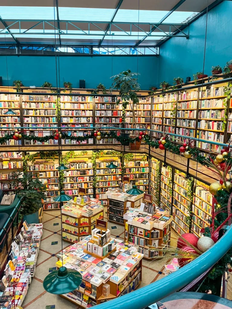 walls lined with bookshelves at cafebreria pendulo in polanco, mexico city