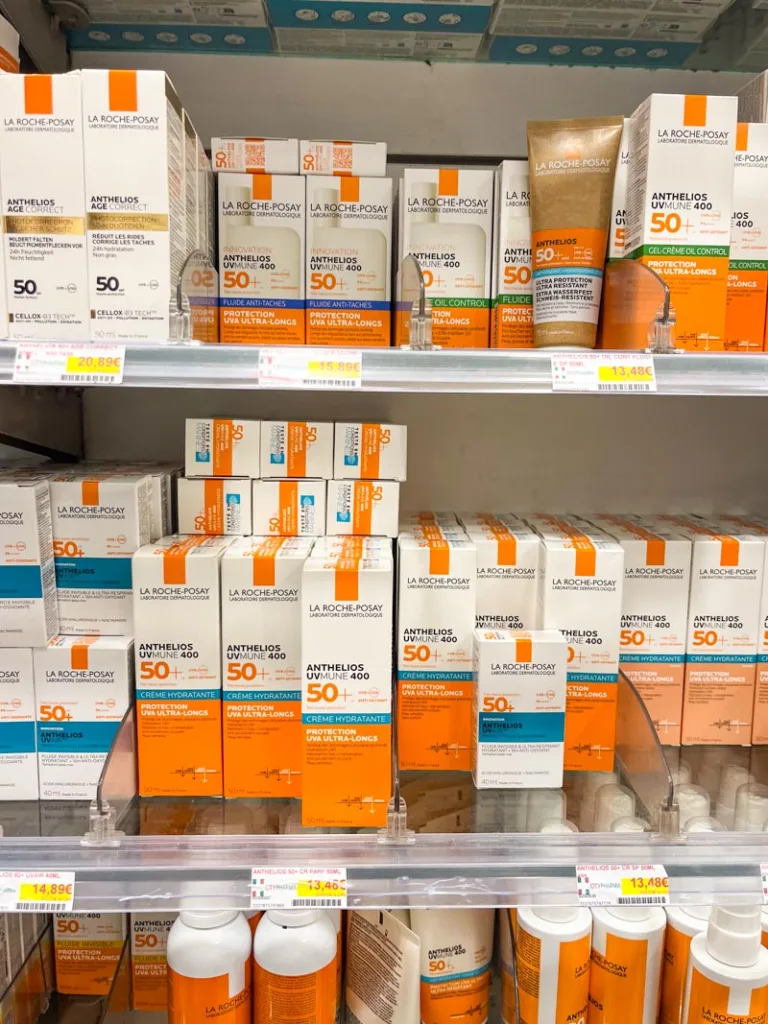 shelves of discounted la roche posay sunscreen at citypharma in saint germain des pres, paris