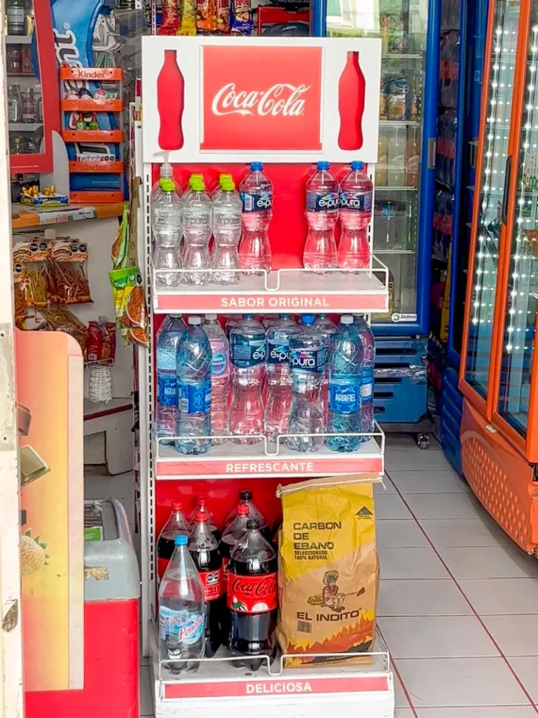 stand with water bottles at a corner store in mexico city
