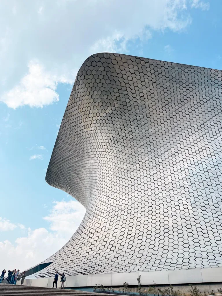 silver, tall, and wavy structure of soumaya museum in polanco, in mexico city