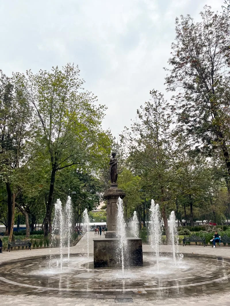 fountain in the alameda central park in mexico city historic center