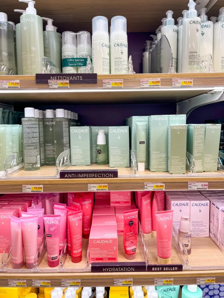 shelves of discounted caudalie products at citypharma in paris