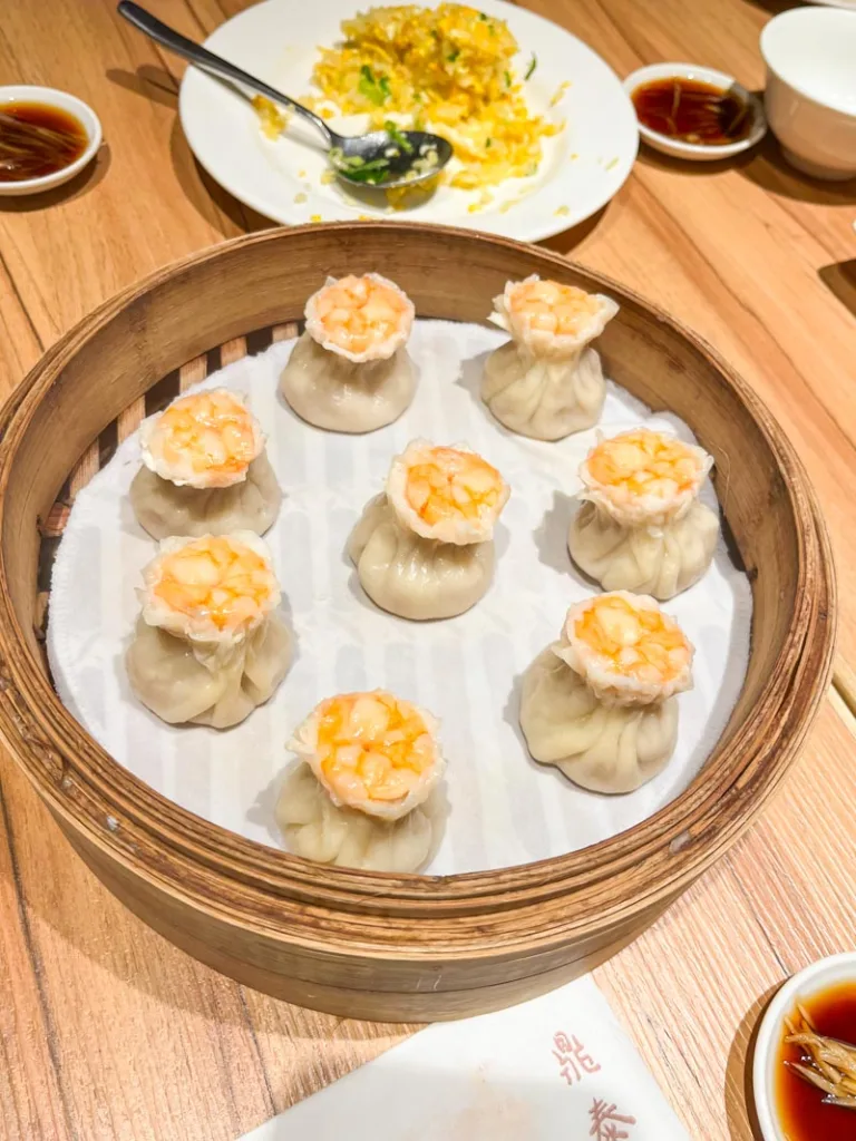 shrimp dumplings in a dumpling steamer at din tai fung in london