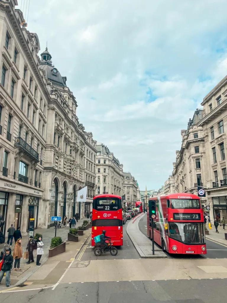 red double decker buses on regent street in london