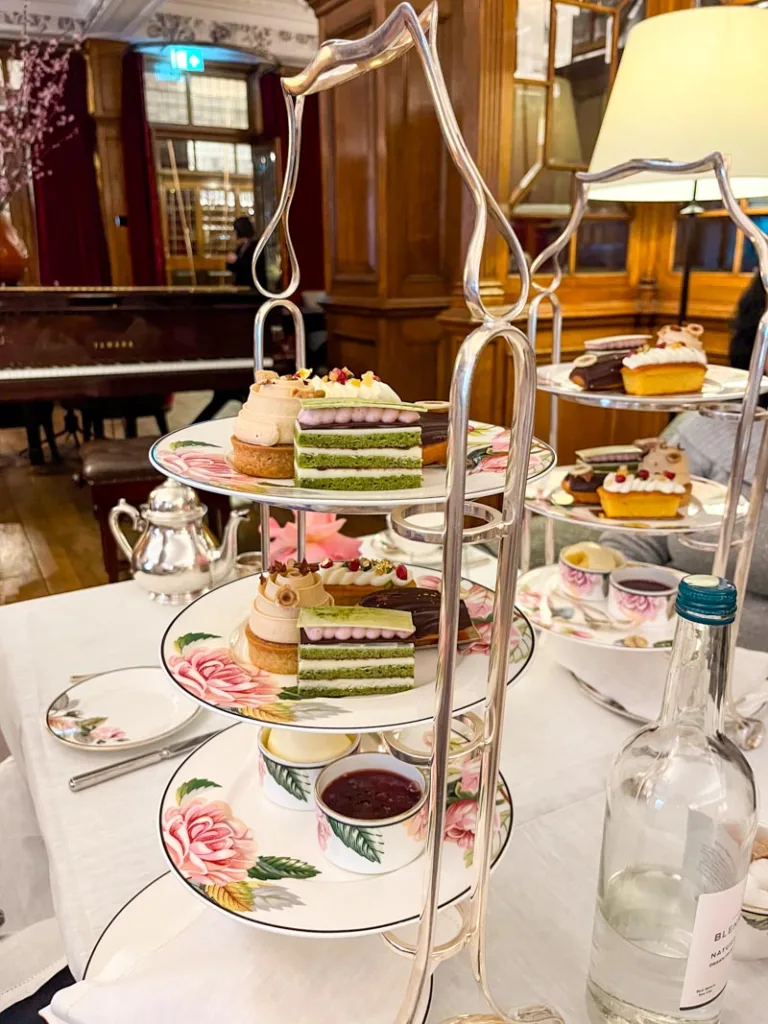 tower of pastries at afternoon tea in browns hotel drawing room in london