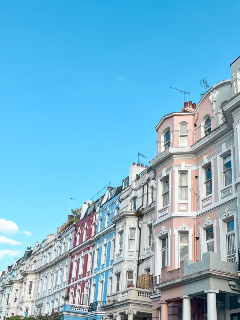 row of colorful houses in notting hill, london
