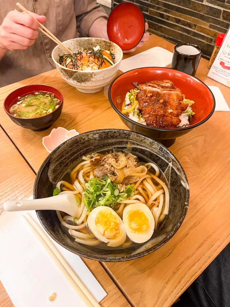 udon bowl, a katsu-don, an a salmon bowl at tokyo diner in london